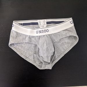 Grey Mundo Unico brief